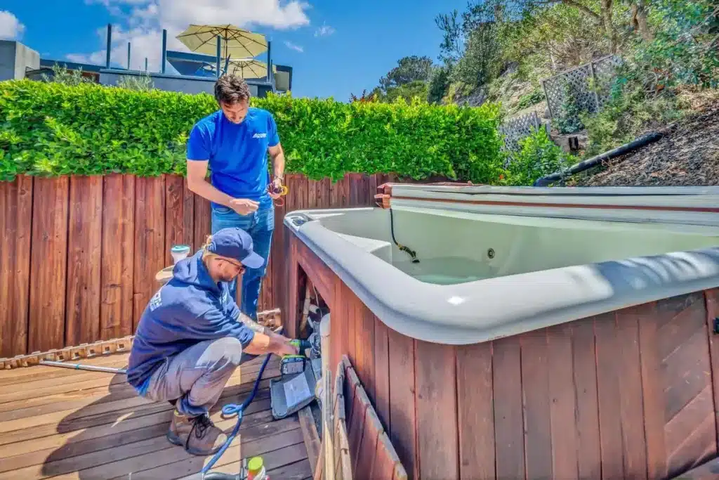 Spa Repair Team fixing pump